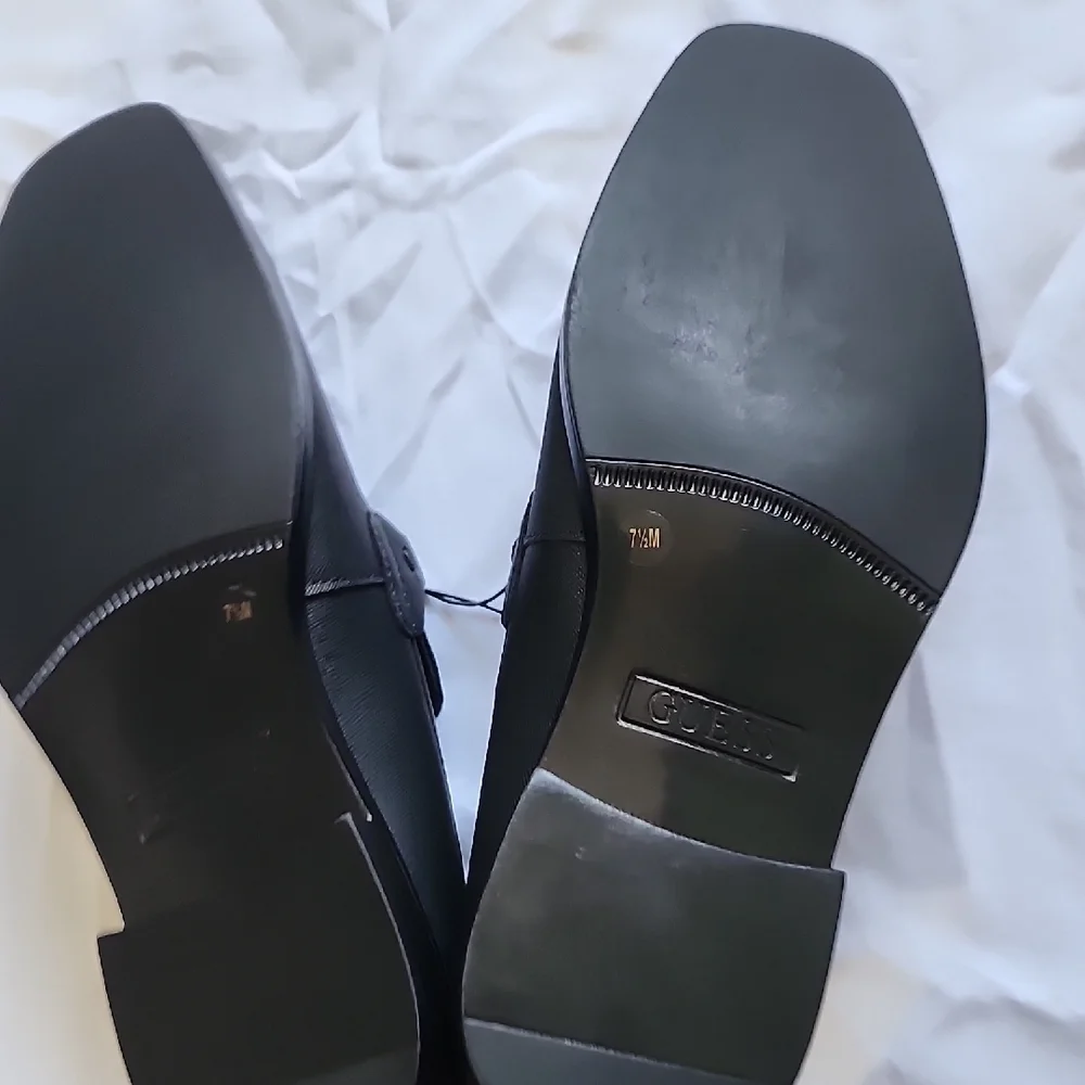 GUESS Men's Black Slip-On Loafers with Silver Accent